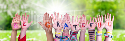 Children Hands Building Word Be Grateful, Grass Meadow