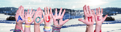 Children Hands Building Word About Me, Snowy Winter Background