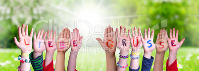 Children Hands Building Word Liebe Gruesse Means Best Wishes, Grass Meadow