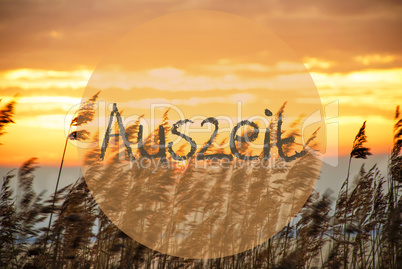 Beach Grass At Sunrise Or Sunset, Text Auszeit Means Downtime