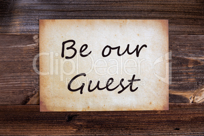 Old Paper, Text Be Our Guest, Wooden Background