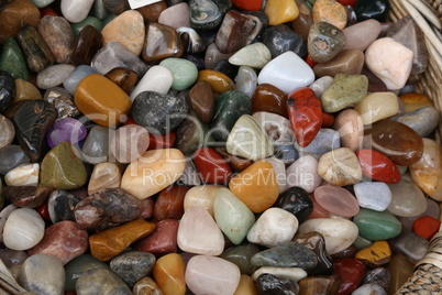 Collection of different types of polished pebble stones