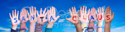 Children Hands Building Word Santa Claus, Blue Sky