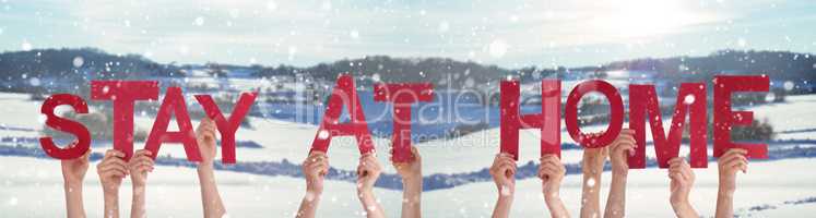 People Hands Holding Word Stay At Home, Snowy Winter Background