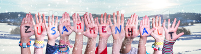 Kids Hands Holding Word Zusammenhalt Means Togetherness, Snowy Winter Background