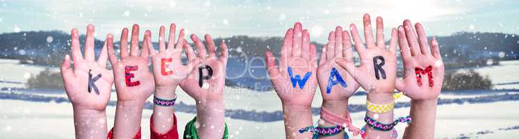 Children Hands Building Word Keep Warm, Snowy Winter Background