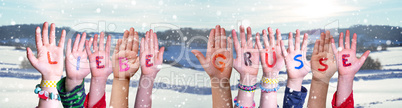 Children Hands Building Liebe Gruesse Means Best Wishes, Snowy Winter Background