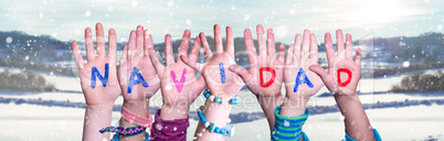 Children Hands Building Word Navidad Means Christmas, Snowy Winter Background
