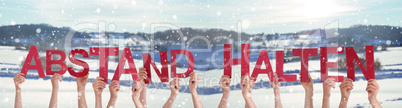 People Hands Holding Word Abstand Halten Means Keep Distance, Winter Background