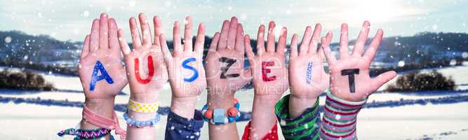 Children Hands Building Word Auszeit Means Downtime, Snowy Winter Background