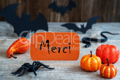 Orange Label, Text Merci Means Thank You, Scary Halloween Decoration