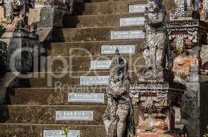 stairs and sculptures in a temple complex