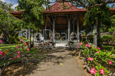 building with roof and flowers in a temple