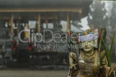 Colorful statue of temple in fog