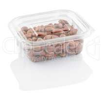 peanuts groundnuts in a transparent plastic container