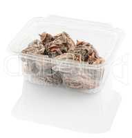 dried persimmon in a plastic food container,