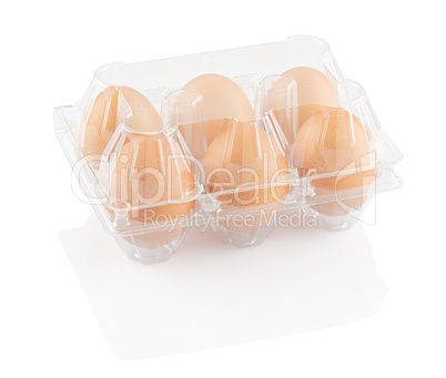 chicken eggs in a plastic container