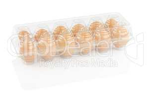 chicken eggs in a plastic container