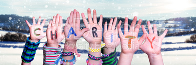 Children Hands Building Word Charity, Snowy Winter Background
