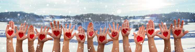 Children Hands With Heart Symbol, Winter Snow Scenerey As Background