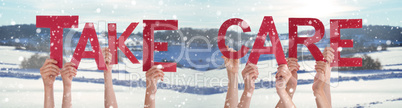 People Hands Holding Word Take Care, Snowy Winter Background