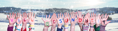 Kids Hands Holding Word Viel Gesundheit Means Stay Healthy, Snowy Winter Background