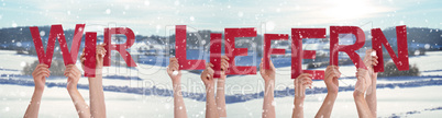 People Hands Holding Word Wir Liefern Means Delivery Service, Winter Background