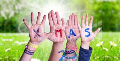 Children Hands Building Word Xmas, Grass Meadow