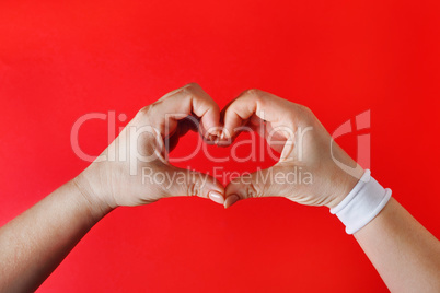 Hands making heart sign