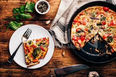 Vegetable frittata with broccoli and red bell pepper