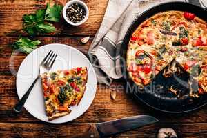 Vegetable frittata with broccoli and red bell pepper