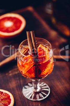 Glass of orange whiskey sour cocktail