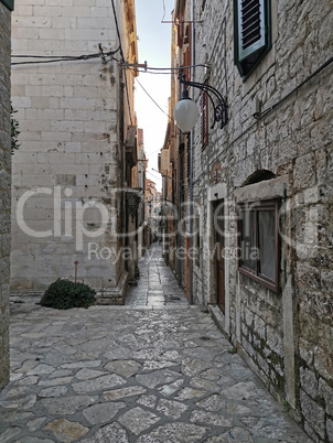 Tourist city by the Adratic sea - Sibenik, Croatia. The old stones, narrow street and stairs