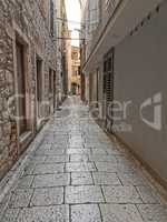 Tourist city by the Adratic sea - Sibenik, Croatia. The old stones, narrow street and stairs