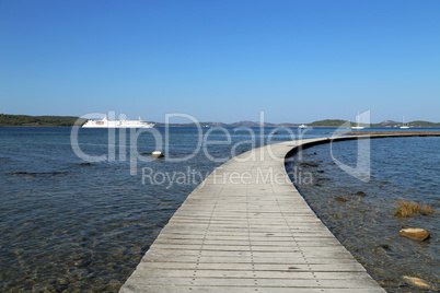 Wooden path to the island to the fortress of St. Nicholas, Croatia