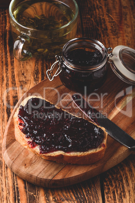 Toast with berry jam and green tea