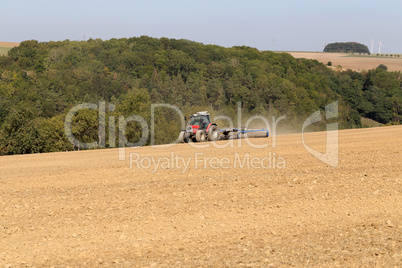 Tractor at agricultural work in the field