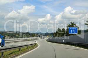 Motorway entry in Germany. German highway with visible cars, signs