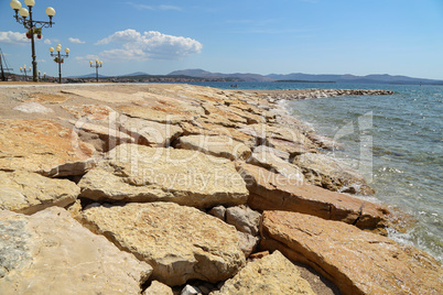 Sea embankment lined with large natural stones