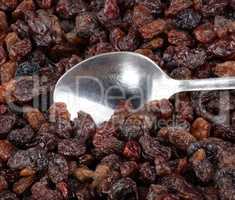 raisin background and teaspoon