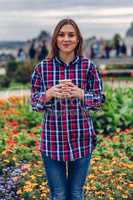 Beautiful young woman holding coffee cup