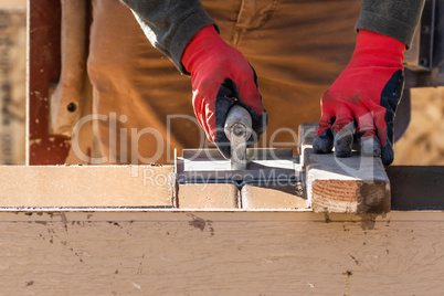 Construction Worker Using Hand Groover On Wet Cement Forming Cop