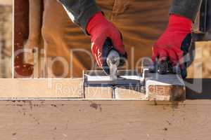 Construction Worker Using Hand Groover On Wet Cement Forming Cop