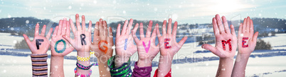 Children Hands Building Word Forgive Me, Snowy Winter Background