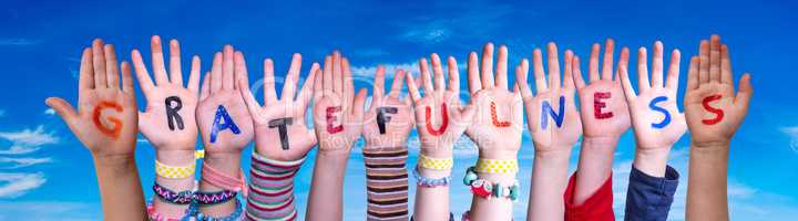 Children Hands Building Word Gratefulness, Blue Sky