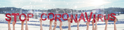 People Hands Holding Word Stop Coronavirus, Snowy Winter Background