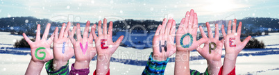 Children Hands Building Word Give Hope, Snowy Winter Background