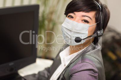 Woman At Office Desk Wearing Medical Face Mask