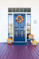 Beautiful House Porch Decorated For Halloween with Pumpkins Wear