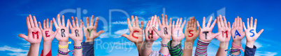 Children Hands Building Word Merry Christmas, Blue Sky